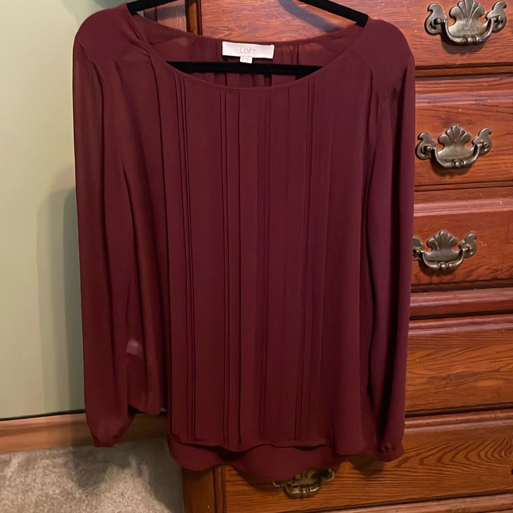 Super cute and feminine flowing long sleeve top